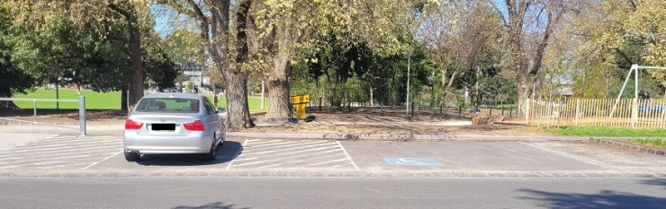 Disability parking at a local park. One delineated, one not
